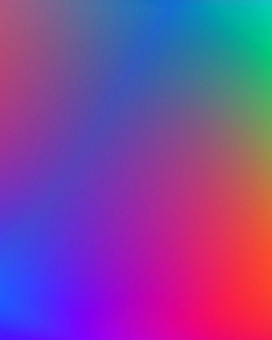 a blurry image of a rainbow colored background